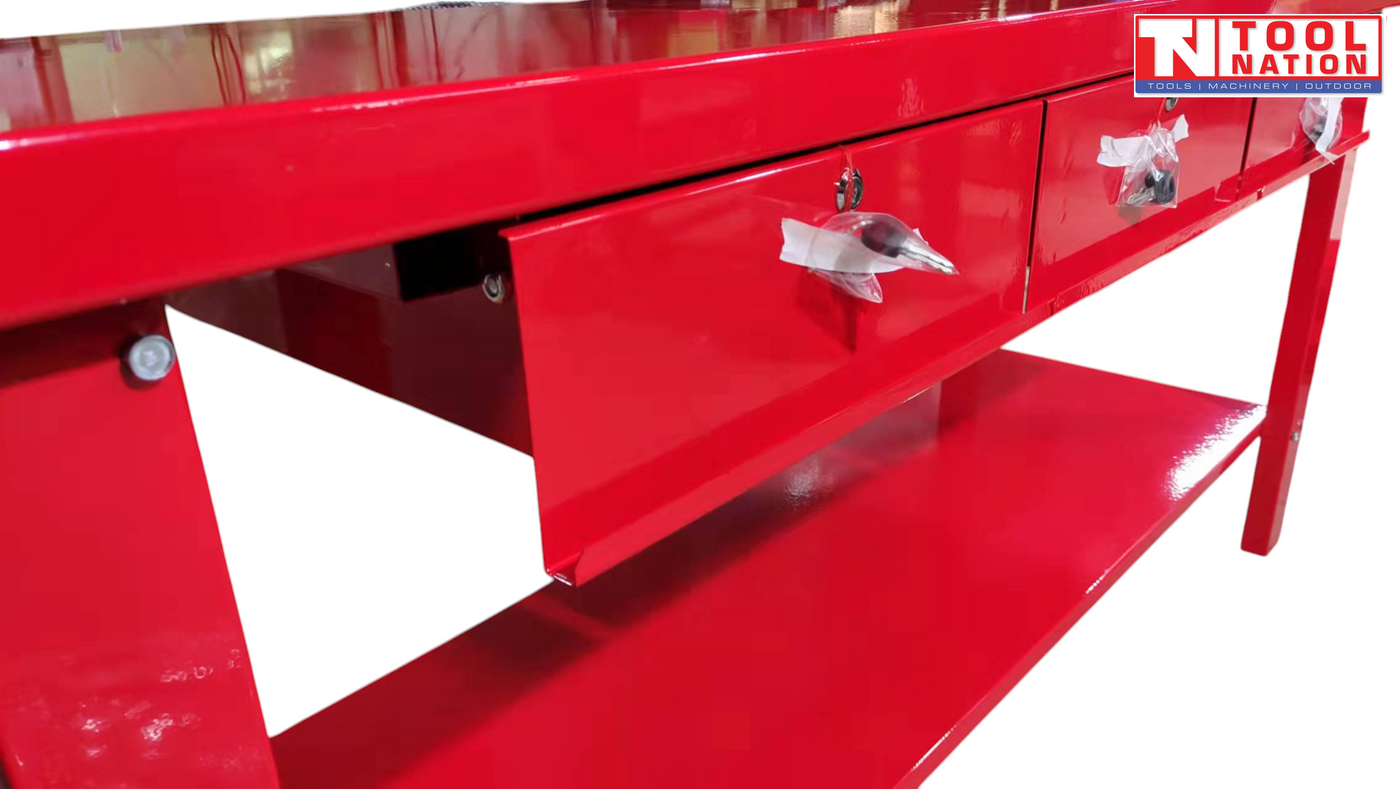 Close-up angled view of red workbench with one drawer partially open.