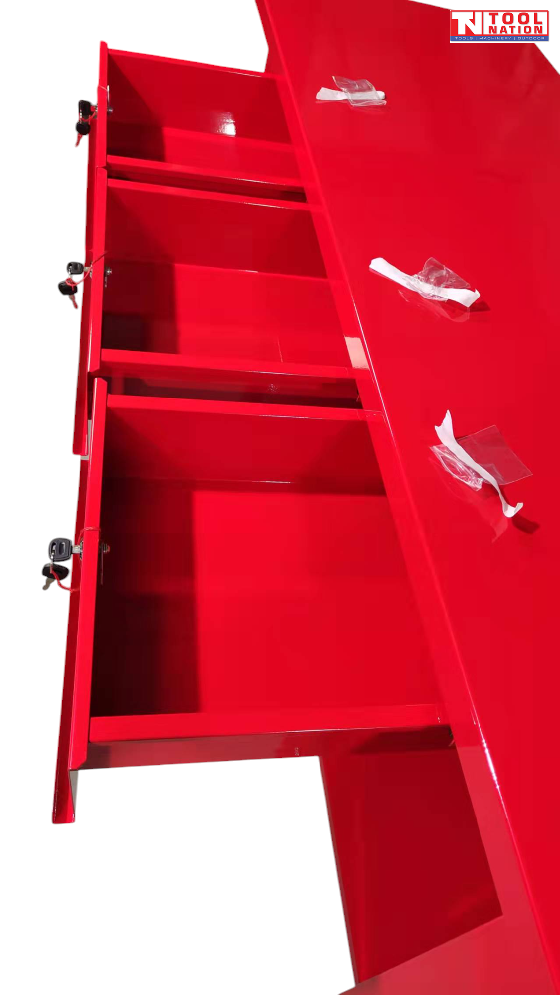 Top-down angled view of red workbench with three open drawers.