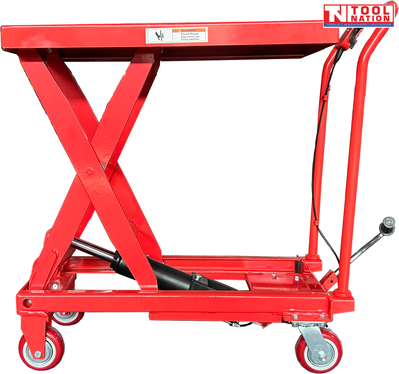 Side view of a red hydraulic lift table cart with raised scissor frame, handle, wheels, foot pedal, and warning label.
