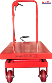 Front view of a red hydraulic lift table cart with lowered platform, handle, wheels, foot pedal, and visible capacity text.