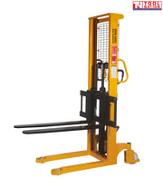 Yellow pallet stacker with black forks, mesh guard, chain mechanism, handle, wheels, and load labels on the upright.