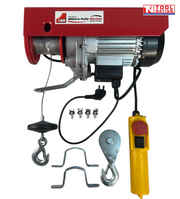 Red electric hoist with cable drum, hooks, mounting brackets, bolts, power cord, and yellow pendant control on a white background.